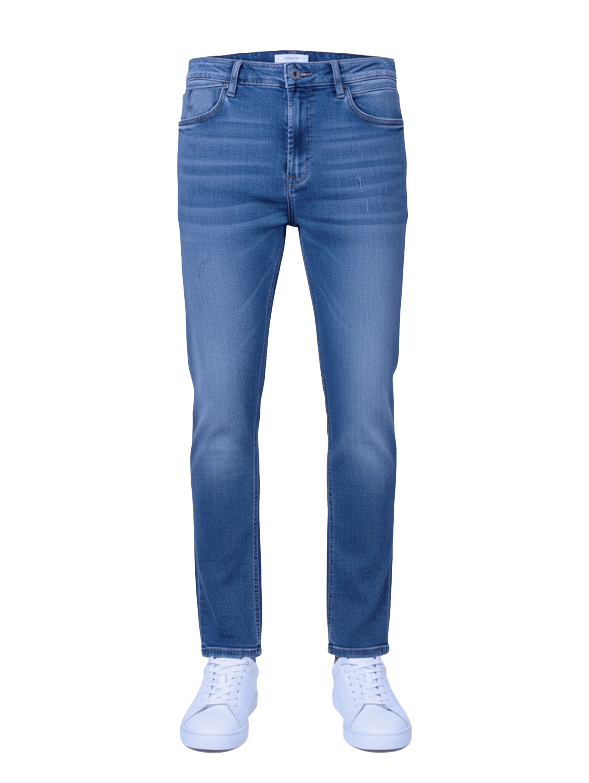 Edge Casuals | Blue jeans worn with white sneakers on a white background