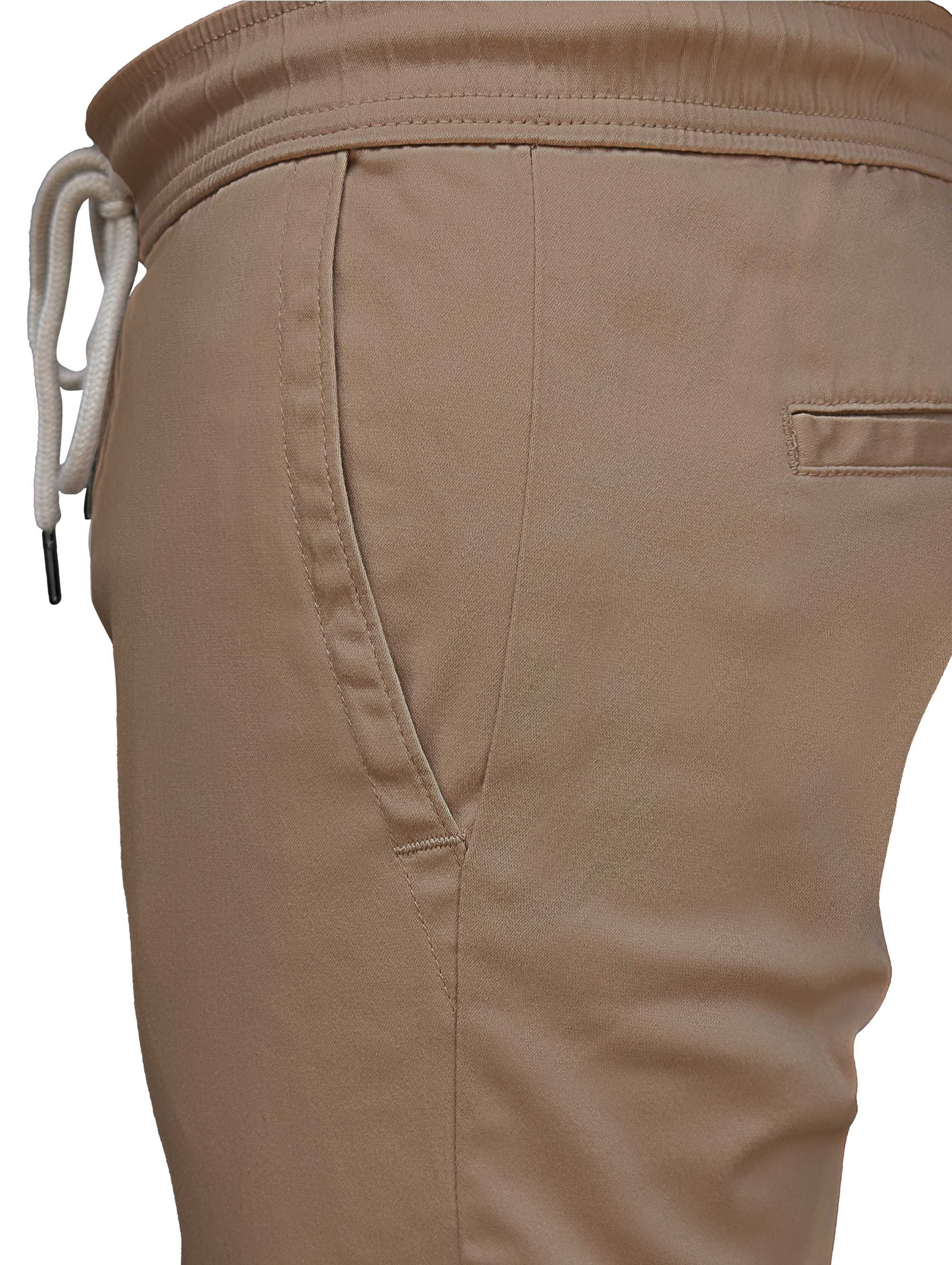 Close-up of beige pants with a drawstring on a white background